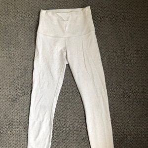 White lululemon full length yoga pants with design